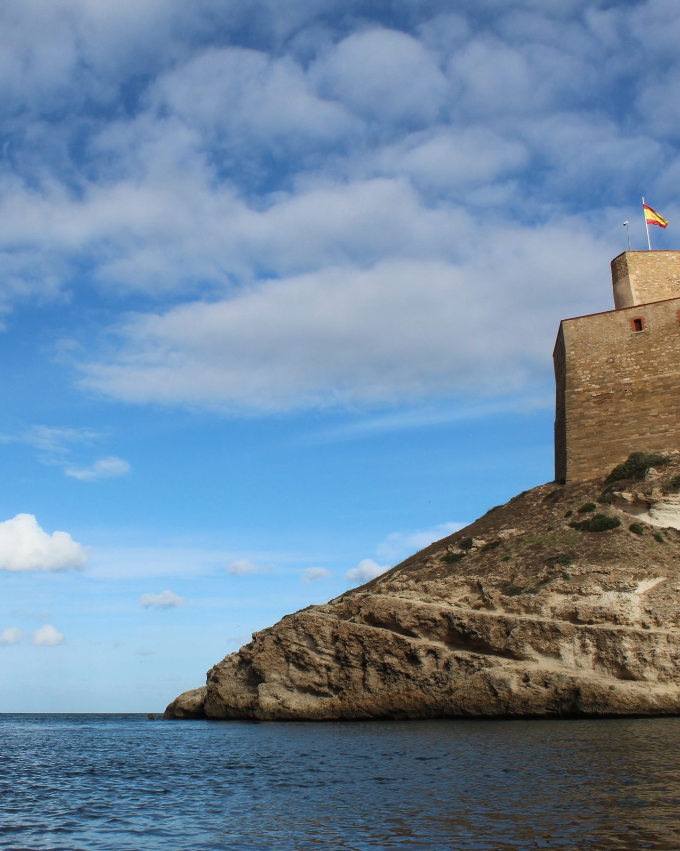 Historic Spanish fortress of Melilla la Vieja perched on clifftop over sea